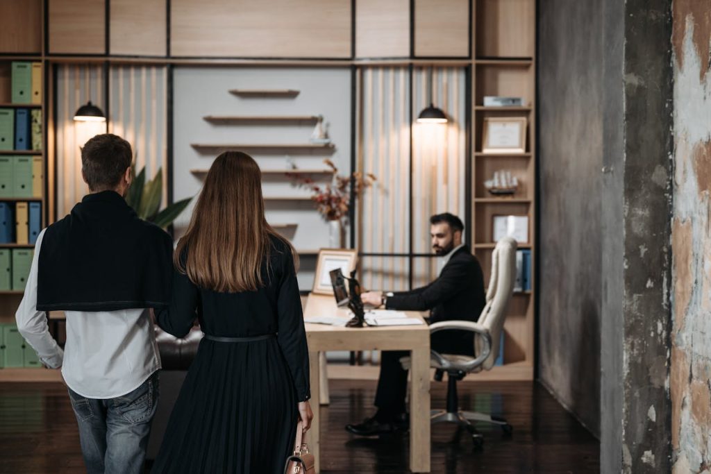 a-couple-walking-in-the-office-8112154